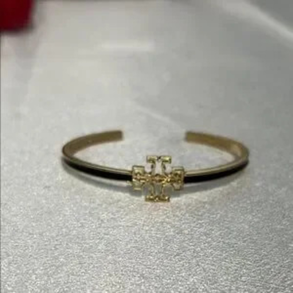 New Tory Burch gold and black bracelet